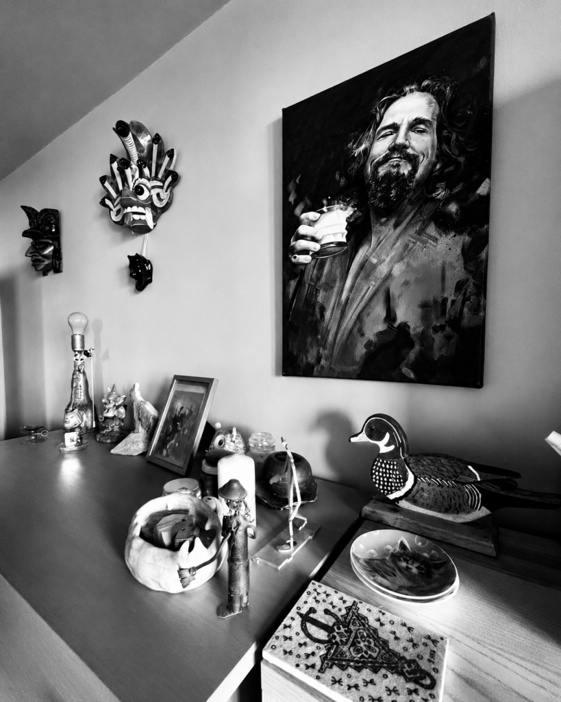 Personal art and collected objects inside a lived-in home in Grochów, Warsaw