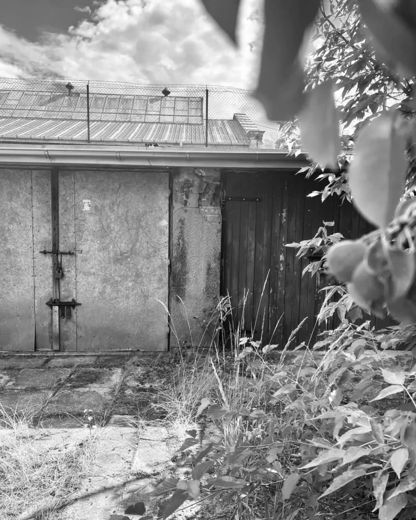 Old garages in the courtyard of a 1936 tenement in Kamionek, Warsaw