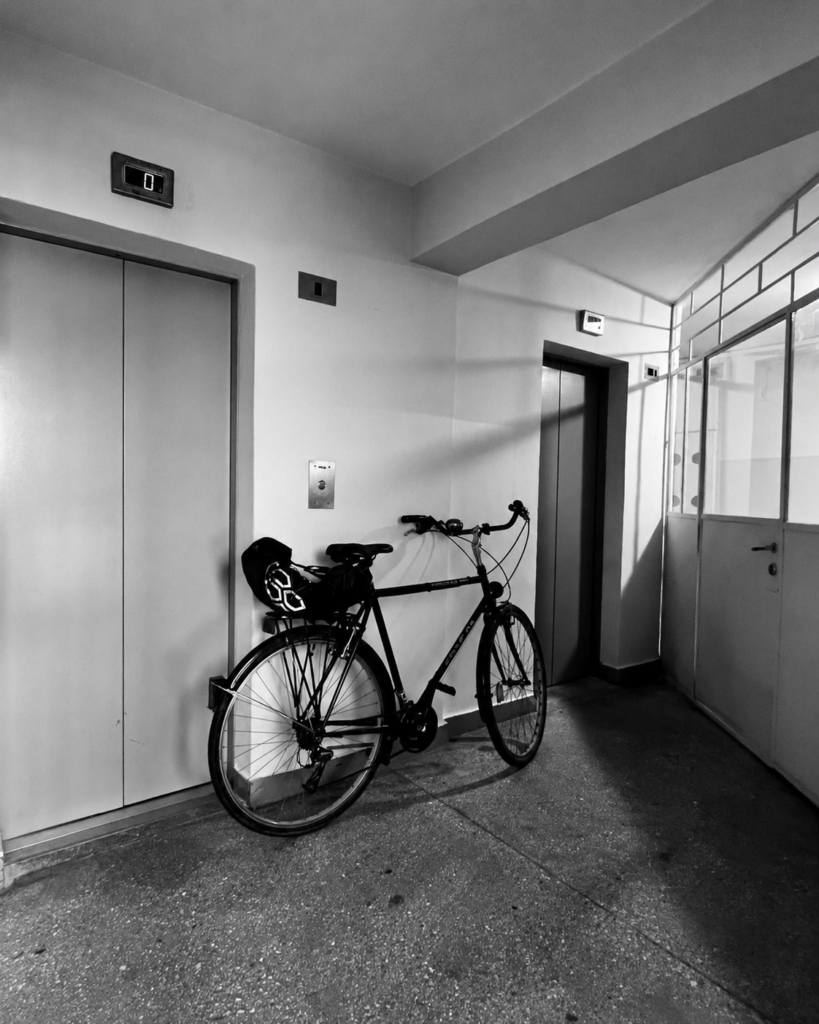 Lift lobby with a bicycle inside the 1985 Grochowska 200 high-rise in Grochów, Warsaw
