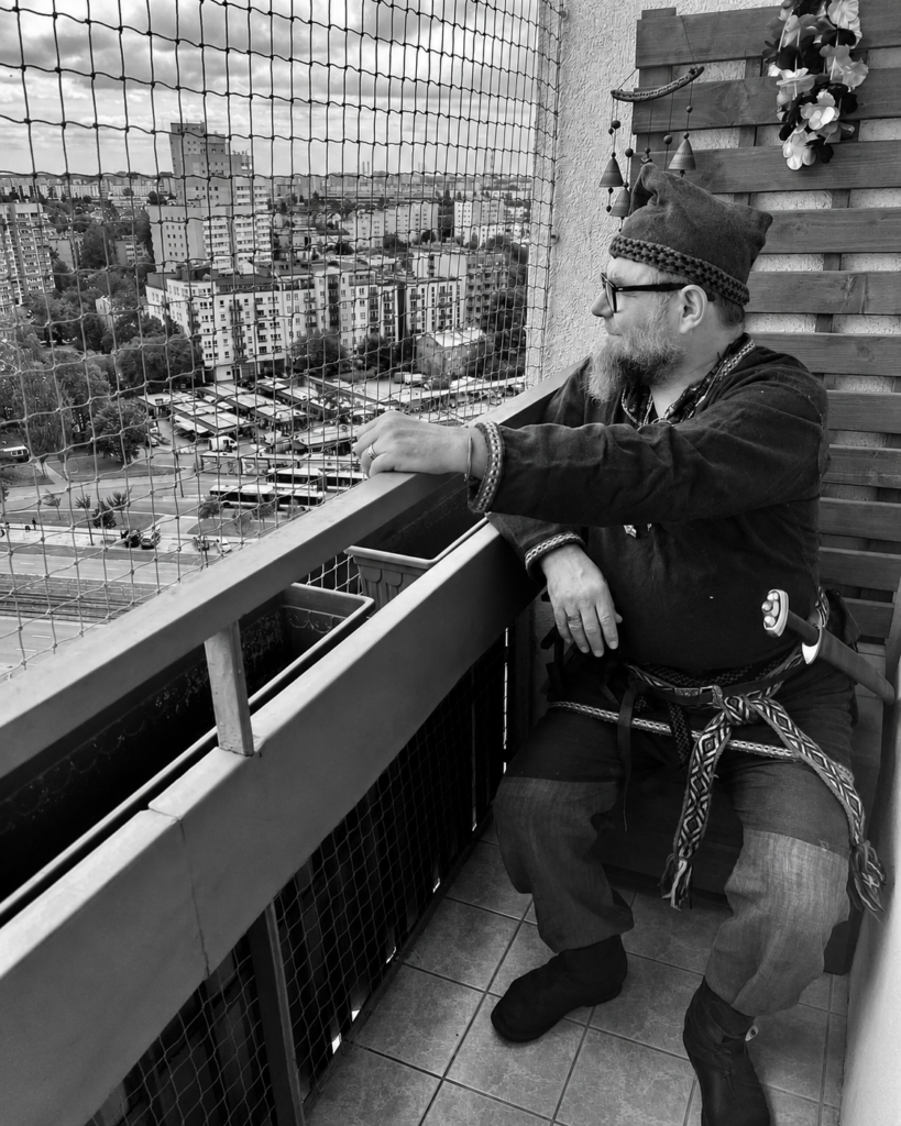 Personal art and collected objects inside a lived-in home in Grochów, Warsaw