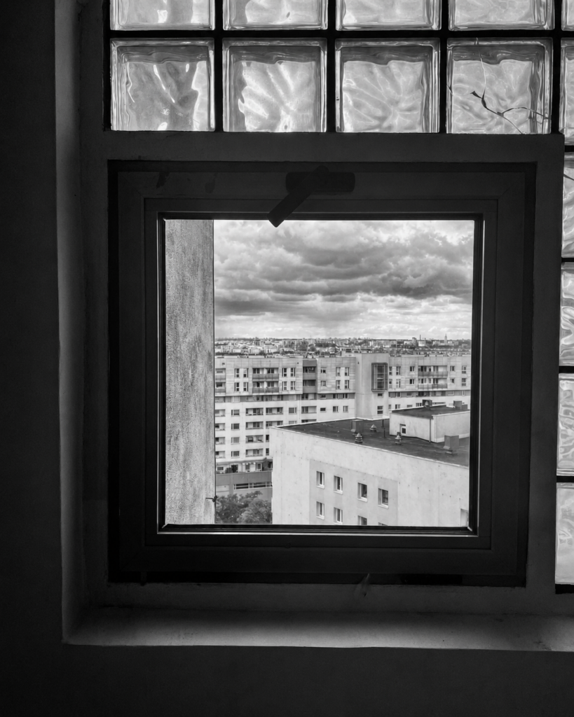 Glass-block stairwell inside the 1985 Grochowska 200 high-rise in Grochów, Warsaw