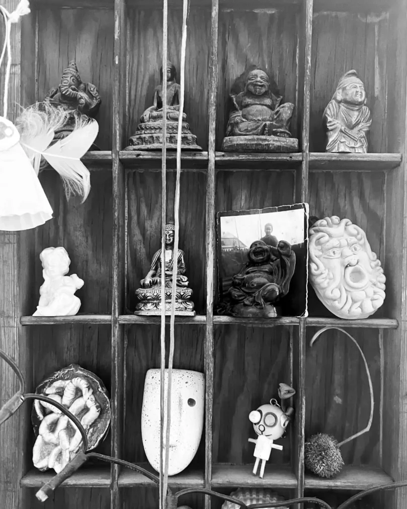 Vintage printer’s type case filled with miniatures in a lived-in Kamionek apartment